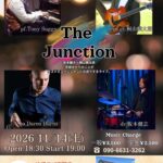 ライブ「The Junction」ポスター。出演：Tony Suggs、桐山麟太郎、Daren Burns、坂本健志。日時：2026年11月14日(土)19時開演。会場：沖縄そば専門店 ちゅら食堂（つくば市）。料金：一般3,500円、学生2,500円。
